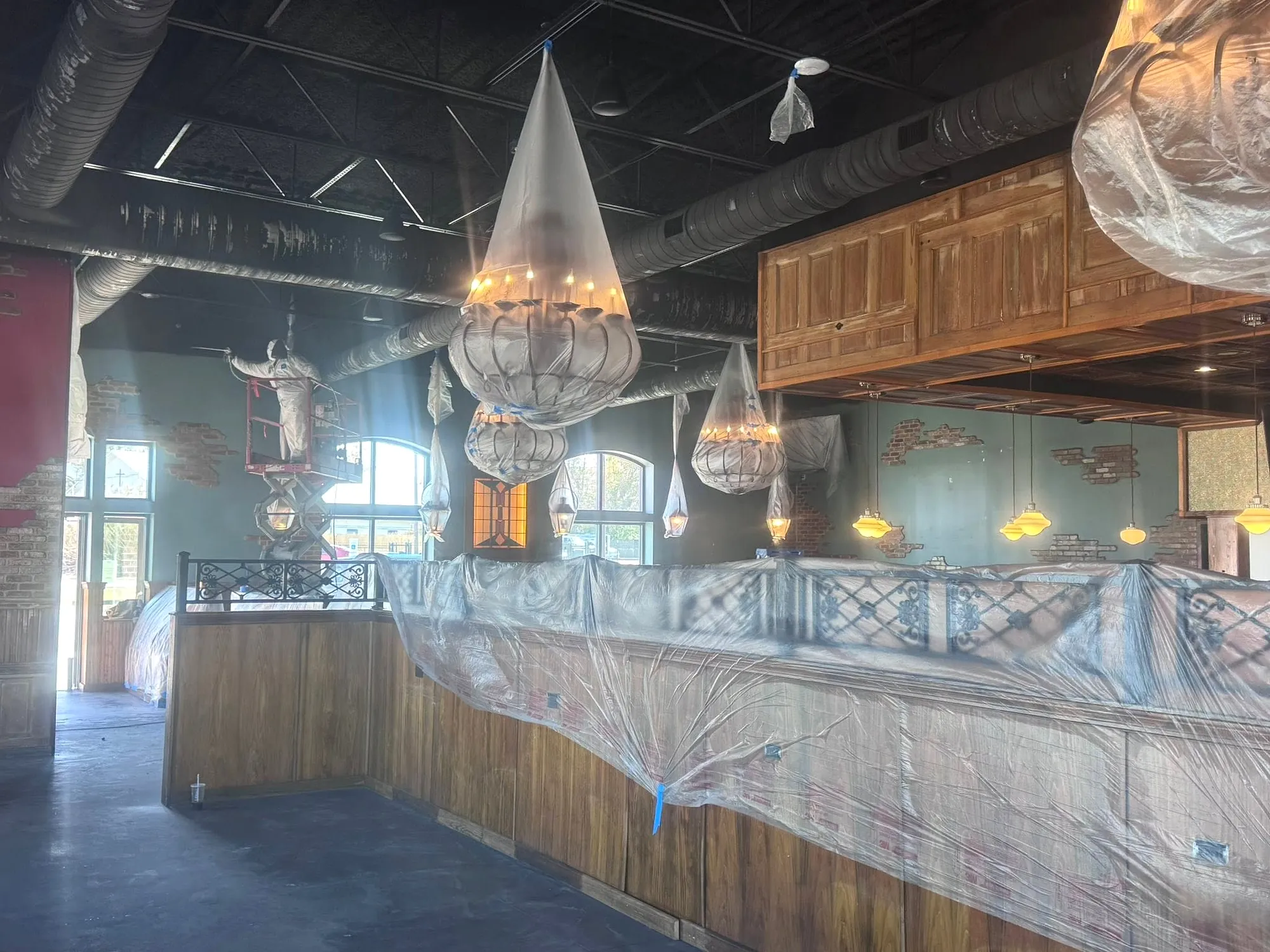 Chandeliers protected during work